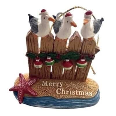 3 Meeuwen op paalhoofd Merry Christmas rode zeester